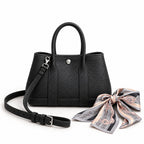 Weekday Tote Mini 23 cm open-top tote in black with a matching shoulder strap and twilly scarf