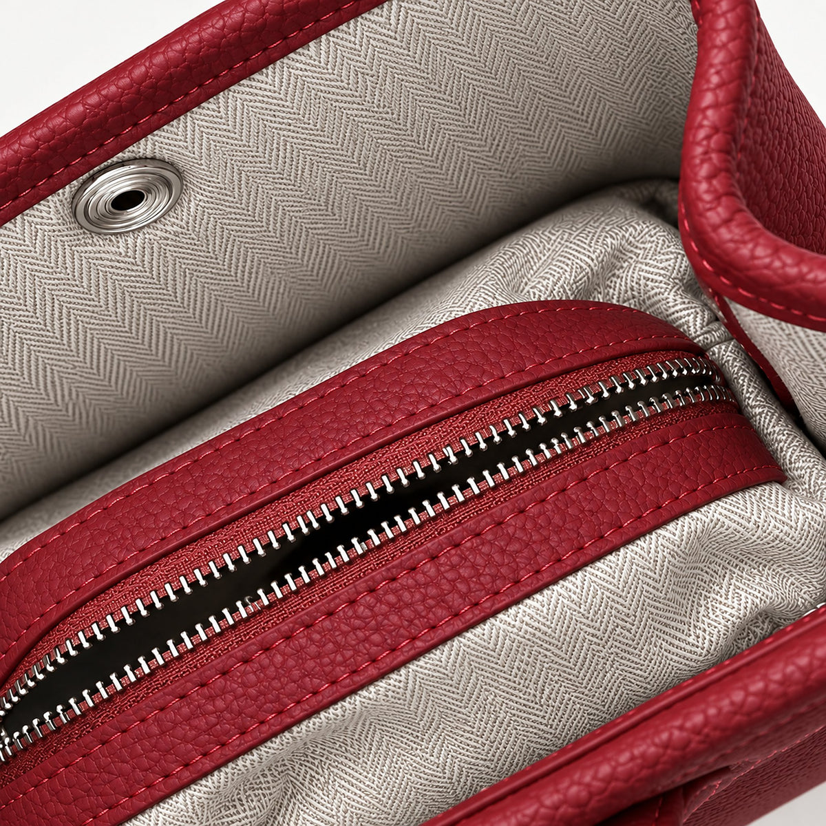 Weekday Tote Mini 23 cm open-top tote in burgundy, interior view with herringbone lining and zip pocket