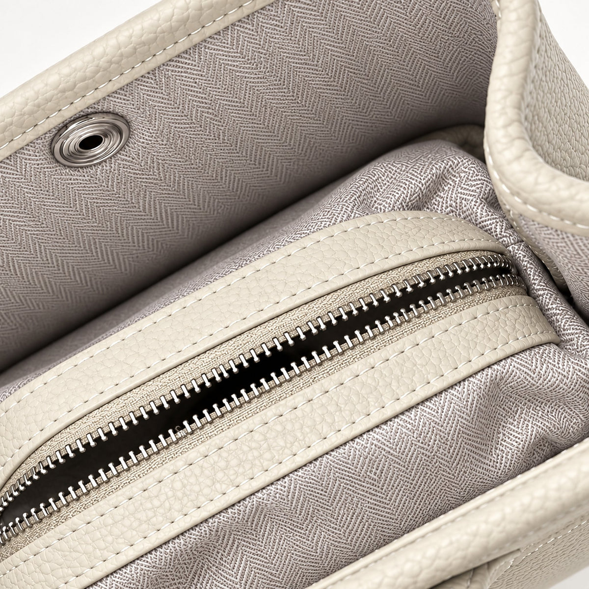 Weekday Tote Mini 23 cm open-top tote in white, interior view with herringbone lining and zip pocket
