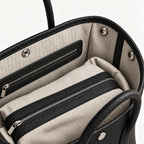 Weekday Tote Medium 30 cm open-top tote in black, interior view with canvas lining and zip pocket