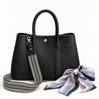 Weekday Tote Medium 30 cm open-top tote in black with the included woven shoulder strap and twilly scarf