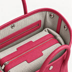 Weekday Tote Medium 30 cm open-top tote in hot pink, interior view with canvas lining and zip pocket