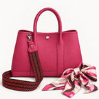 Weekday Tote Medium 30 cm open-top tote in hot pink with the included woven shoulder strap and twilly scarf